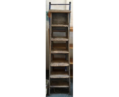 Two folding step ladders 