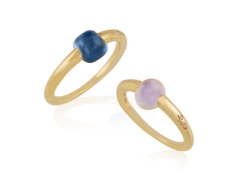 POMELLATO: TWO GEM-SET "M'AMA NON M'AMA" RINGSEach set with either a blue topaz or moonstone cabochon, in closed-back setting