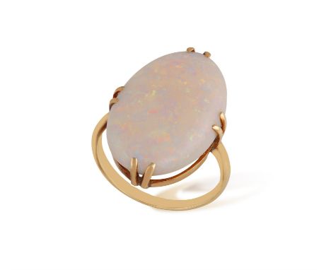 AN OPAL RINGSet with an oval-shaped cabochon opal, to a polished mount, mounted in gold, ring size J Condition Report:  Opal 