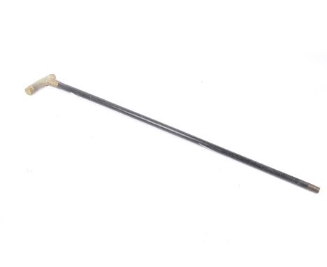 A 20th century walking stick. Having a horn handle and engraved gilt metal presentation collar. Dated 1904. L92cm