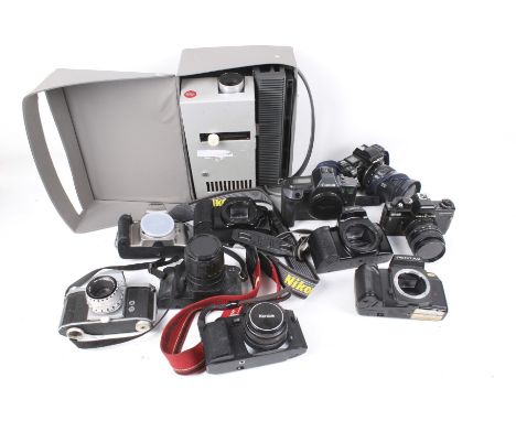 A Leica 35mm slide projector and a box of SLR film cameras. Including Canon, Nikon and Pentax, etc. 