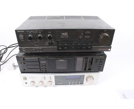 Three vintage HiFi separates. Including a Technics amplifier SU-V55A, a Nakamichi BX-150E cassette deck and a Pioneer amplifi