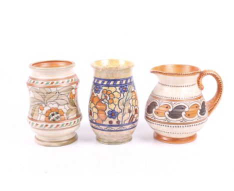 Three Charlotte Rhead for Crown Ducal pottery items. Comprising two vases and a jug. Max. H17.5cm