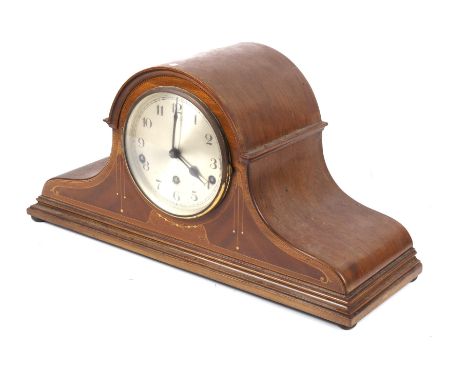 An Edwardian mantel clock. The chrome dial with Arabic numerals, in a mahogany case with satinwood marquetry decoration, H25c