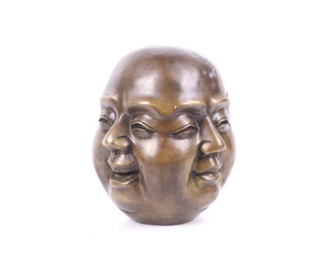 A large bronze four-faced Buddha head. Depicting four emotions, with a four character mark to base. H22cm