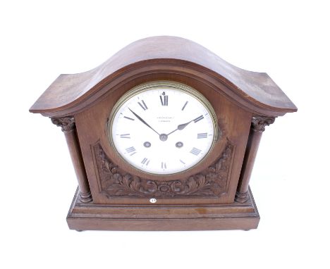 A J. W. Benson Ltd mahogany cased mantel clock. Having a Medaille D'Argent 1855 mechanism no. 965052, striking to a gong, whi