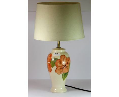 A Moorcroft 'Hibiscus' pattern table lamp, H. 53cm (Including shade). Excellent condition.