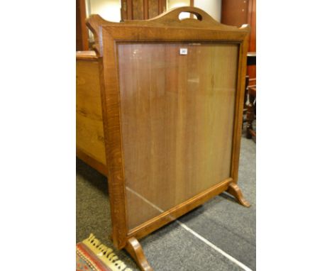 An oak framed fire screen; a Persian wool carpet in tones of terracotta 150 x 200cm