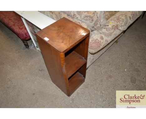An art deco walnut small open fronted bookcase