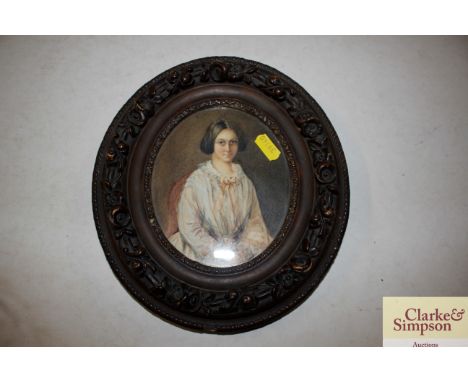 A Victorian school oval portrait watercolour miniature in decorative gilt frame