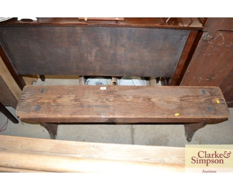A vintage stripped pine bench