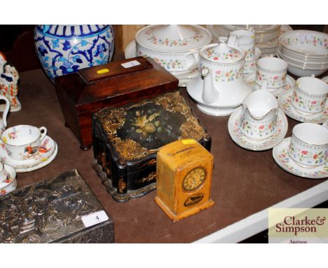A 19th Century mahogany two compartment tea caddy, a Victorian papier mache stationery box and a Mauchline ware money box
