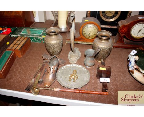 A pair of Eastern brass vases, a wall bracket in the form of a phoenix, various other items of metal ware, a vintage wooden g