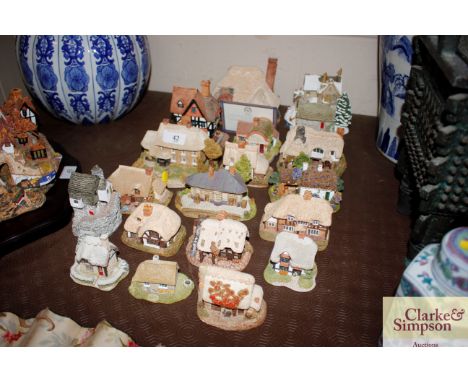 A collection of Various Lilliput Lane model cottages including The Chocolate House, Saxon Cottage, Scotch Mist, The Old Vicar