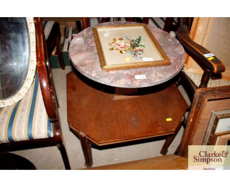 An Art Deco style marble and walnut two tier table