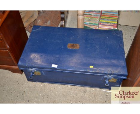 A painted metal trunk