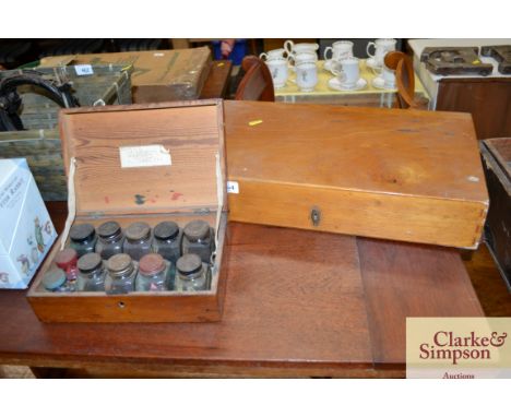 A pine box containing miscellaneous vintage ink bottles and another box containing rulers and drawing instruments 