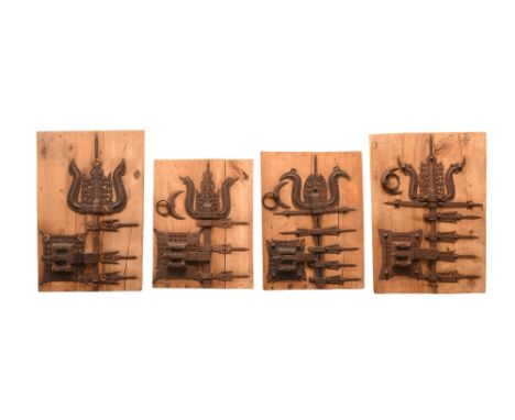 FOUR WOODEN PANELS WITH LARGE PAINTED AND PIERCED IRON DOOR HINGES AND LOCKS AN EYE FOR DETAIL: PROPERTY FROM A PRIVATE ESTAT