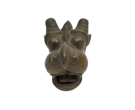 A CAST AND ENGRAVED BRONZE MAKARA HEAD FINIAL AN EYE FOR DETAIL: PROPERTY FROM A PRIVATE ESTATE IN NORTHERN LONDON  South Ind