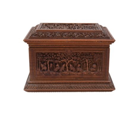 A FINELY CARVED SANDALWOOD JEWELLERY CASKET WITH WILD ANIMALS AND A VILLAGE SCENE Mysore, Karnataka, Southern India, 19th cen