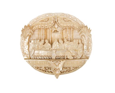 λ A CARVED MOTHER-OF-PEARL SHELL PLAQUE WITH THE LAST SUPPER Bethlehem, Palestine, Holy Land, 20th centuryOf typical circular