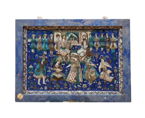 A LARGE POLYCHROME-PAINTED MOULDED QAJAR POTTERY TILE WITH A COURTLY BANQUET SCENE Qajar Iran, 19th centuryOf rectangular sha