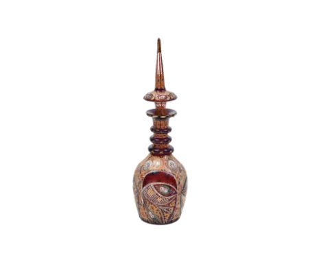 AN INTACT RED AND GILT BOHEMIAN URANIUM CUT-GLASS SPIRIT DECANTER FOR THE IRANIAN EXPORT MARKET Bohemia, Czech Republic, East