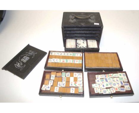 Vintage cased Chinese mahjong set in early wooden case, with 5 drawers of cane backed pieces.