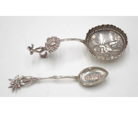Sterling silver caddy spoon hallmarked London 1890-1896, maker: Martin Sugar, together with silver flower spoon marked 800, a