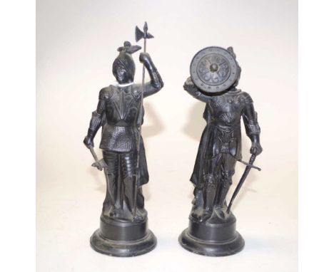 Pair classical spelter warrior form figures each depicting a standing classical warrior, with sword and battle axe defensive 
