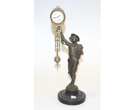 Junghans German Onion Boy swinger mystery clock supporting standing spelter figure, with swinging arm clock movement, (untest