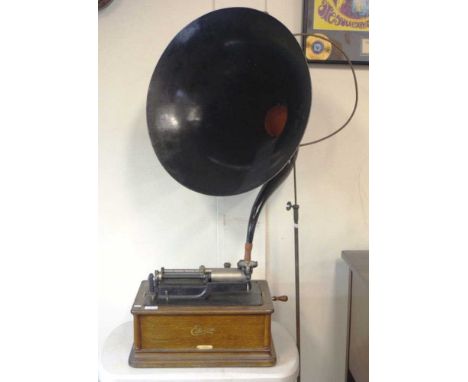 Edison Triumph phonograph model G, SN89559,  handle, spare reproducer, lid, horn, free standing crane and 2 leather belt stri