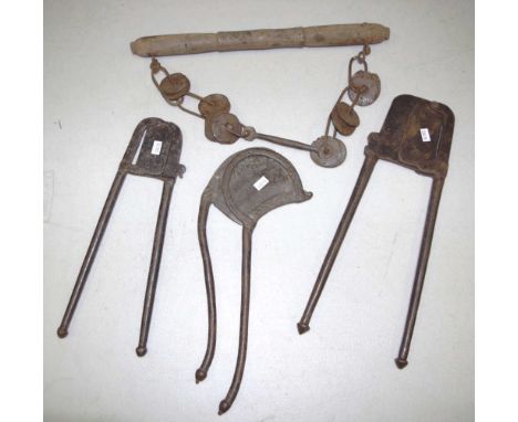 Three pairs of vintage metal tobacco cutters together with a vintage timber and metal instrument