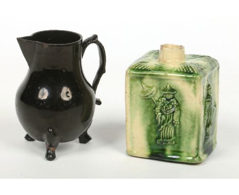 Two pieces of 18th century English pottery. A Whieldon type tea caddy decorated in tortoiseshell glazes and moulded with chin