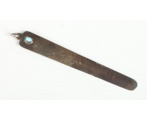 An Edwardian silver book mark by Stuart Clifford. Adorned with a turquoise cabochon. Assayed London 1903, 10cm. Condition Rep