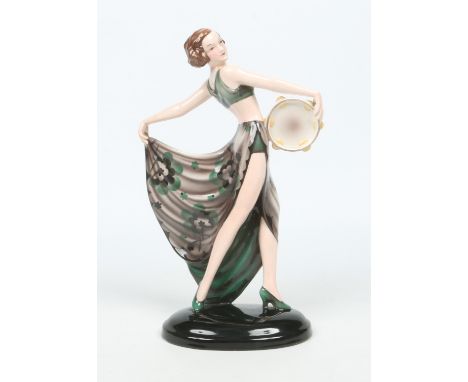 Josef Lorenzl (Austrian 1892-1950). A Goldscheider Art Deco pottery figure of a Tarantella dancer with a tambourine. Coloured