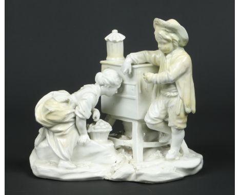 A rare Derby blanc de chine figure group of children at a peep show after the Sevres original. Modelled with a boy leaning ag