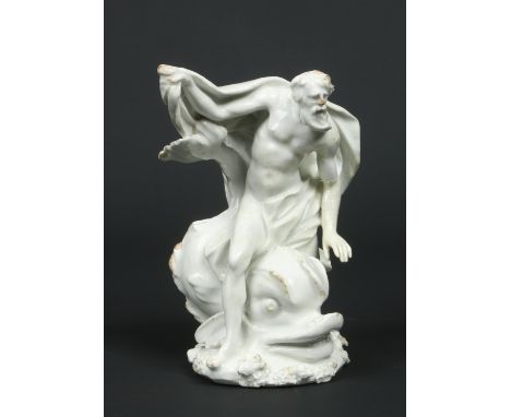 A Bow blanc de chine figure of Neptune. Riding upon the back of a large dolphin and dressed in a long flowing cloak c1760, 16
