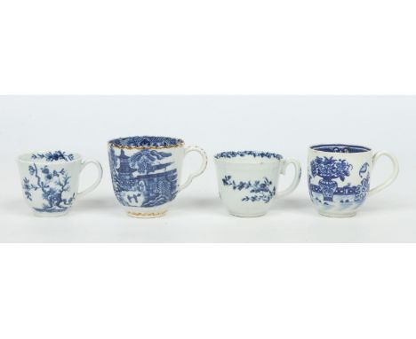Three Worcester coffee cups and a Caughley example decorated in underglaze blue. Prunus root, bat, feather mould floral and t