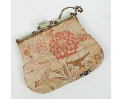 A ladies 1920s embroidered evening bag with Chinese celadon jade mounts, 19cm wide.  Condition Report. To be used as a guide 
