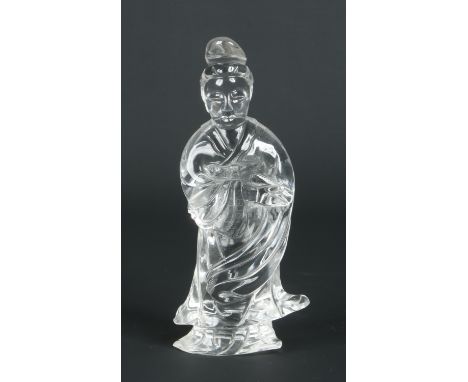 A Chinese carved rock crystal figure of Guanyin. Dressed in a flowing robe and holding a scroll, 20cm. Condition Report. To b
