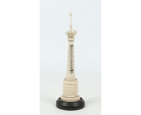 A 19th century Anglo Indian carved ivory column thermometer raised on a hardwood plinth, 31cm. Condition Report. To be used a