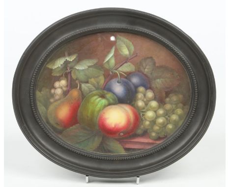 An early 19th century oval Spode plaque in black basalt frame by Stephen Lawrance. Finely painted with fruit on a table. Sign