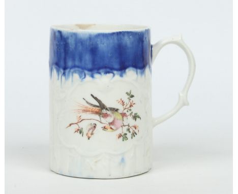 A rare West Pans mug with scrolling handle. Moulded with rococo panels on a fluted ground, the top portion ground in Littler'