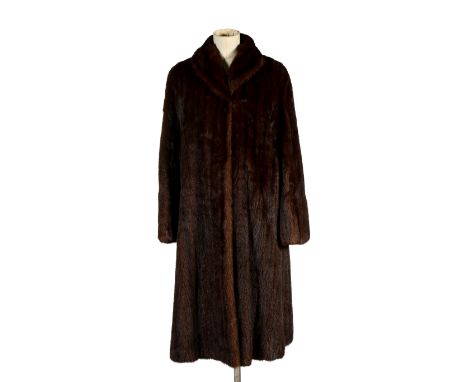 A vintage 1950's Japanese brown mink fur coat. Full length, having a collar and two exterior pockets, the interior lined in b