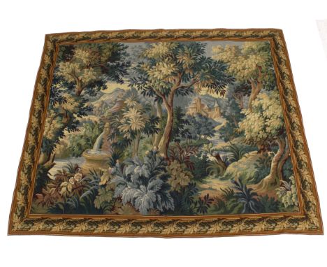 A 17th century style French high quality woven verdure tapestry. Depicting a forest landscape with a fountain to the left and