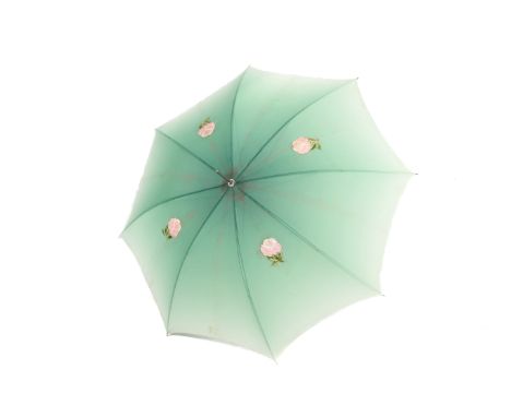 A vintage parasol. The graduated green nylon cover decorated with floral appliques, having an opalescent mother of pearl effe