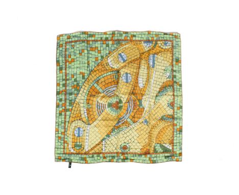 A Rolex silk scarf. In a green and orange and blue brick work design, marked 'Rolex', with a tag, in the original box, 86cm x