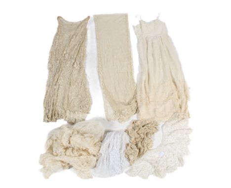 An assortment of Victorian and later machine lace. Including a scarf, a collar with floral decoration, a slip dress with a la