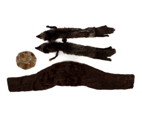 An assortment of vintage fur clothing. Comprising a rabbit fur hat, a mink fur shrug with a brown lining and two 1940's silve